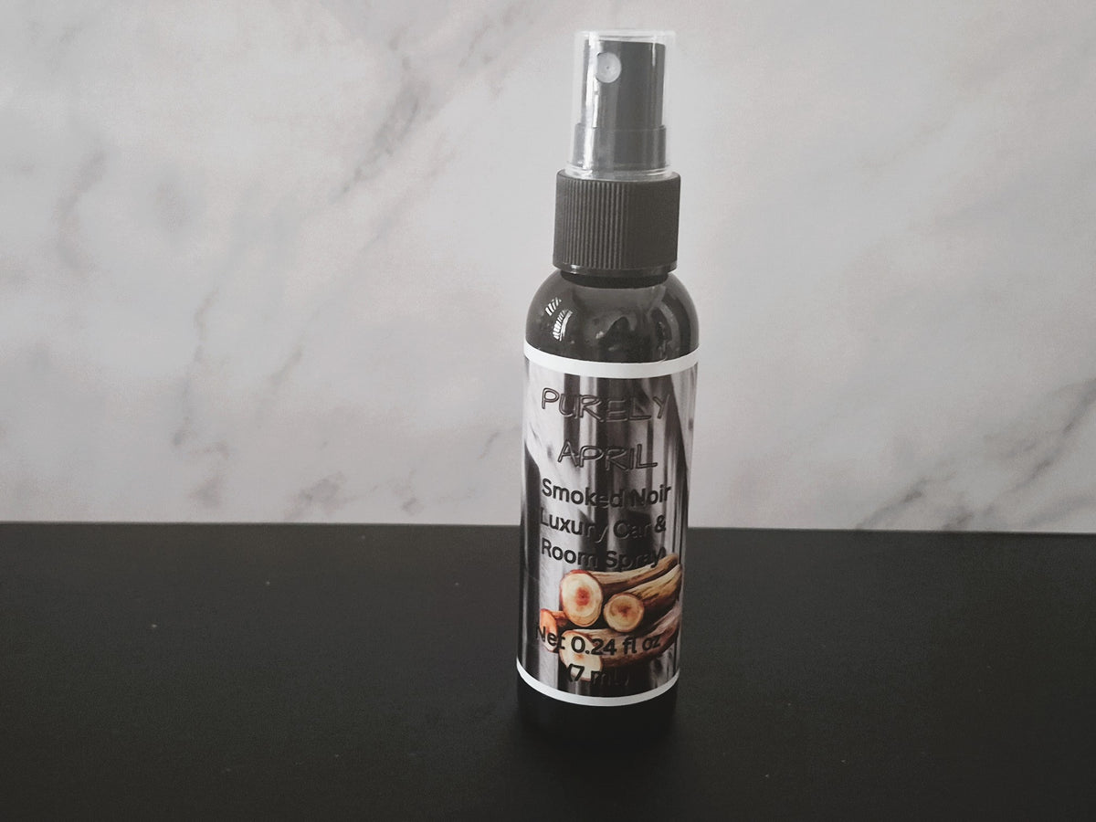 The Vibe: Bold, mysterious, and high-end boutique.
The Scent Profile: Cedar Saffron, Sandalwood, Amber & Fine Cologne.
Product Description:Inspired by the atmosphere of a dark-paneled boutique hotel lobby. Smoked Noir is a deeply sophisticated unisex blend featuring the rugged, grounding notes of smoky cedarwood and sensuous sandalwood. Warmed by a core of golden amber and finished with a crisp, tailored dash of designer cologne, it is the premier choice for the modern driver who loves rich, earthy woods.